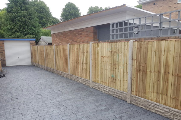 Wooden panel fencing